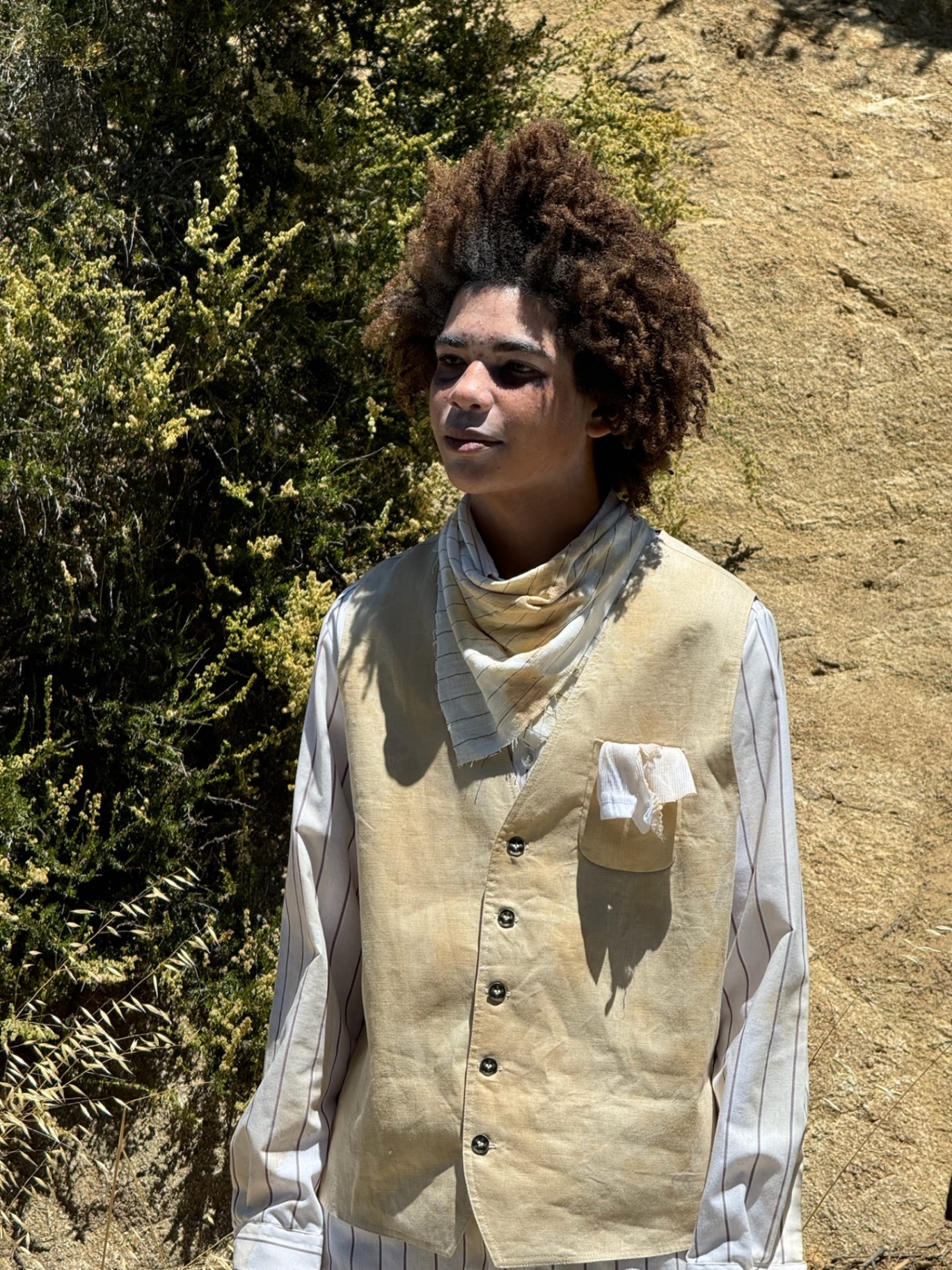 Dogbelly cast member in period wardrobe and full character makeup posed on location.